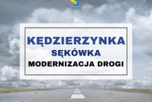 Niebieski napis "Kędzierzynka Sękówka" modernizacja drogi 